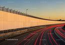 Urban Highway Light Trails at Sunset with Moving Traffic