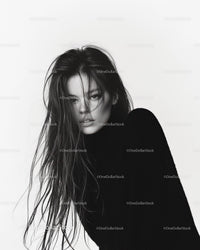 Elegant Black and White Portrait of a Woman with Flowing Hair