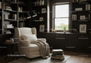Cozy reading nook with armchair and books by window