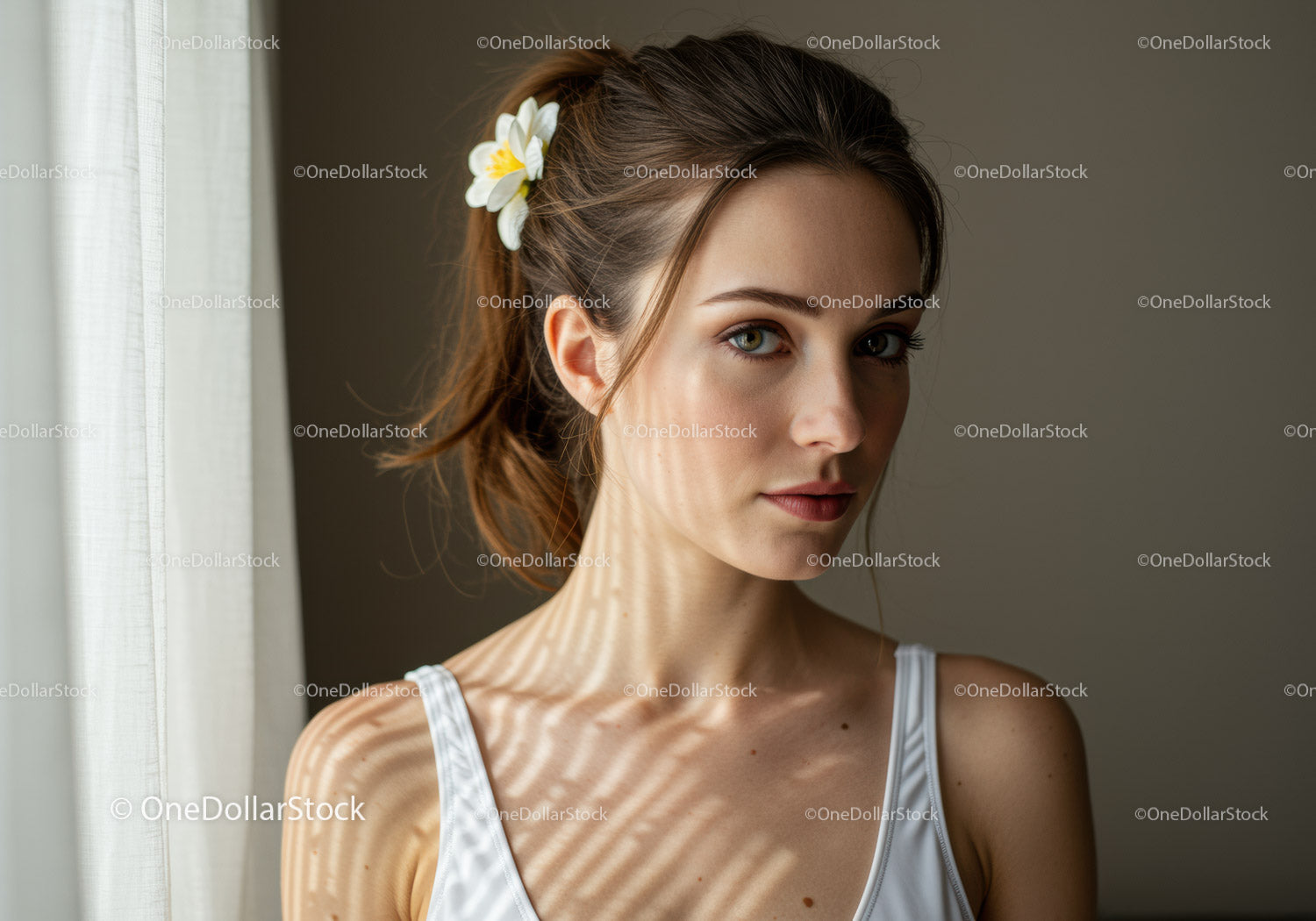 Portrait of a Young Woman with Light Shadows and Flowers