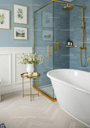 Elegant bathroom with freestanding tub and gold accents