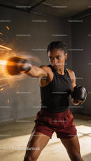 Focused female boxer delivering a powerful punch