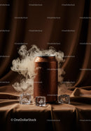 Cold drink can with smoke and ice cubes on fabric