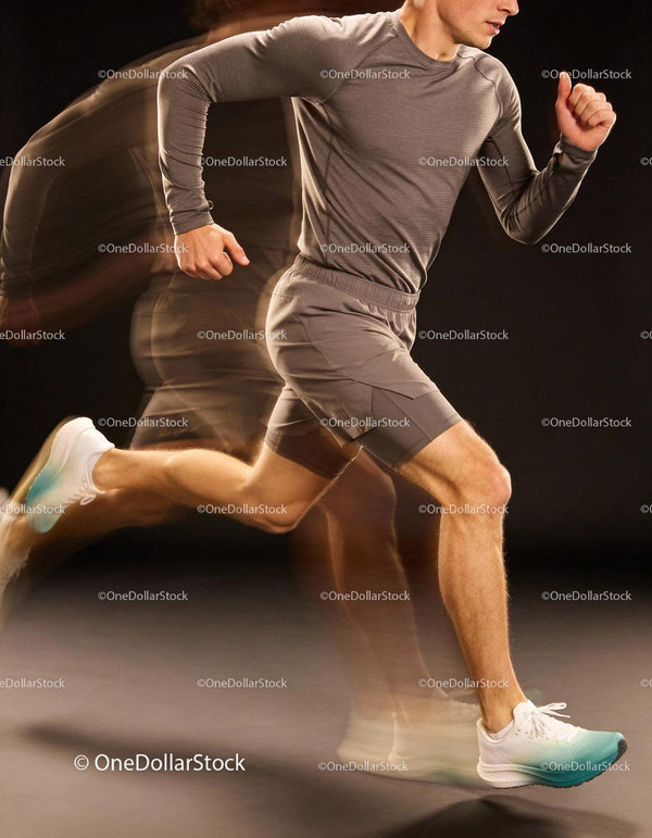 Athlete Sprinting Fast In Motion On Dark Background