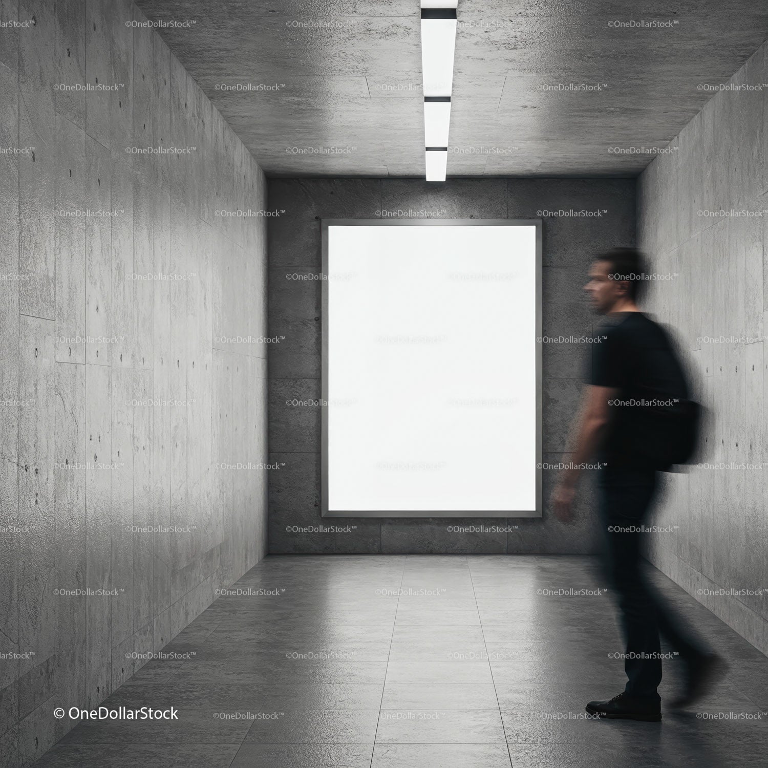 Man Passing by Blank Poster in Modern Concrete Hallway