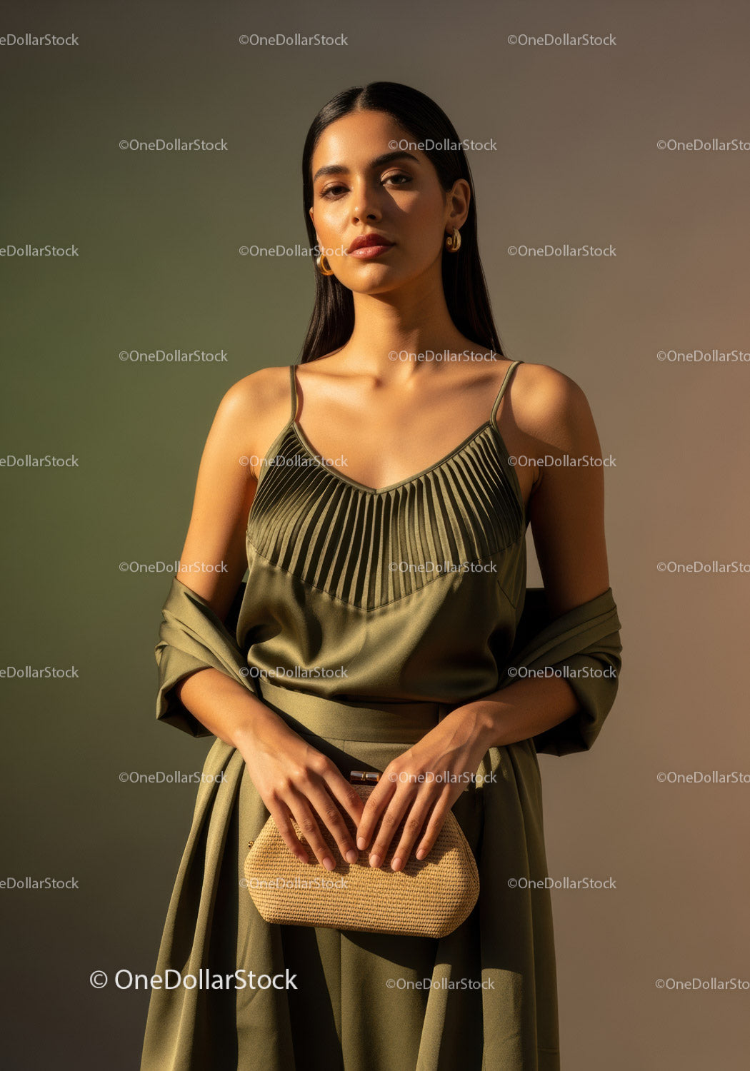 Chic Woman in Satin Beige Outfits with Gold Accessories in Studio