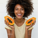 Vibrant Tropical Papaya Fruit with Smiling Young Woman