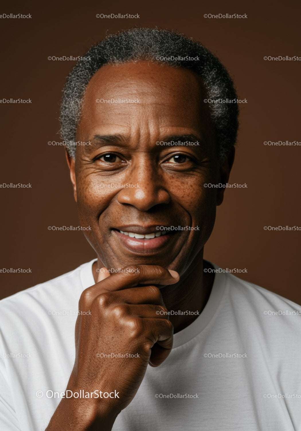 Close-Up Portrait of Happy Mature Man Smiling and Thinking
