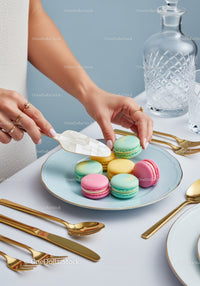 Elegant Assorted Macarons on Stylish Table for Celebration or Gifting