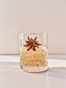 Refreshing sparkling drink with star anise garnish
