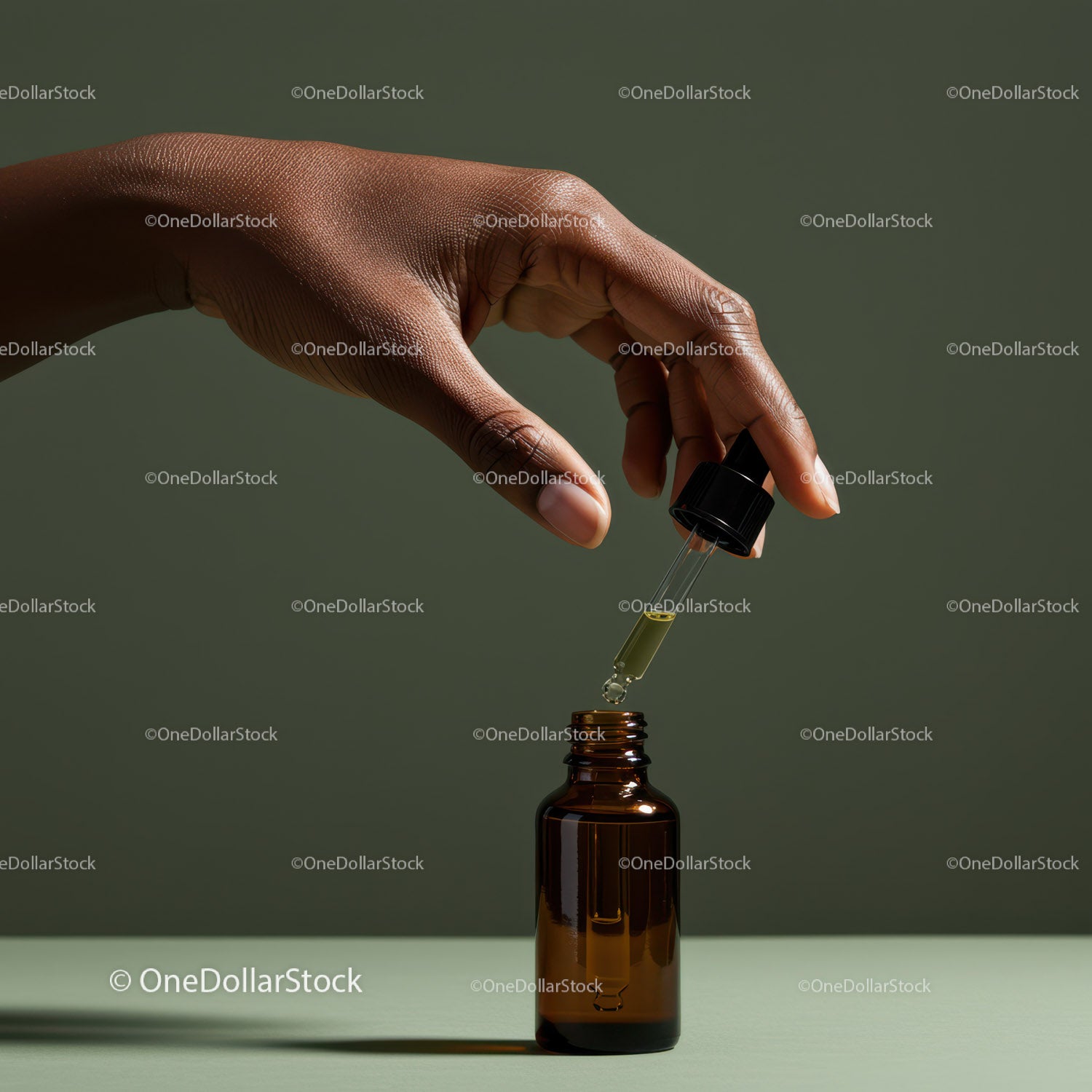 Hand Holding Dropper Filling Amber Glass Bottle for Skincare