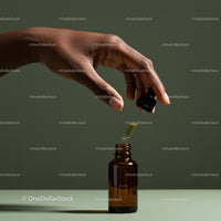 Hand Holding Dropper Filling Amber Glass Bottle for Skincare