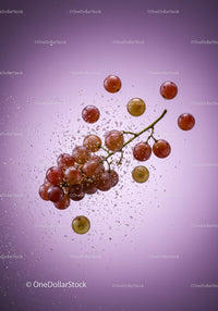 Fresh red grapes submerged with water bubbles