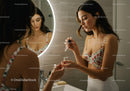 Young Woman Applying Skincare in Modern Bathroom
