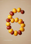 Creative arrangement of lemons and apples in spiral shape