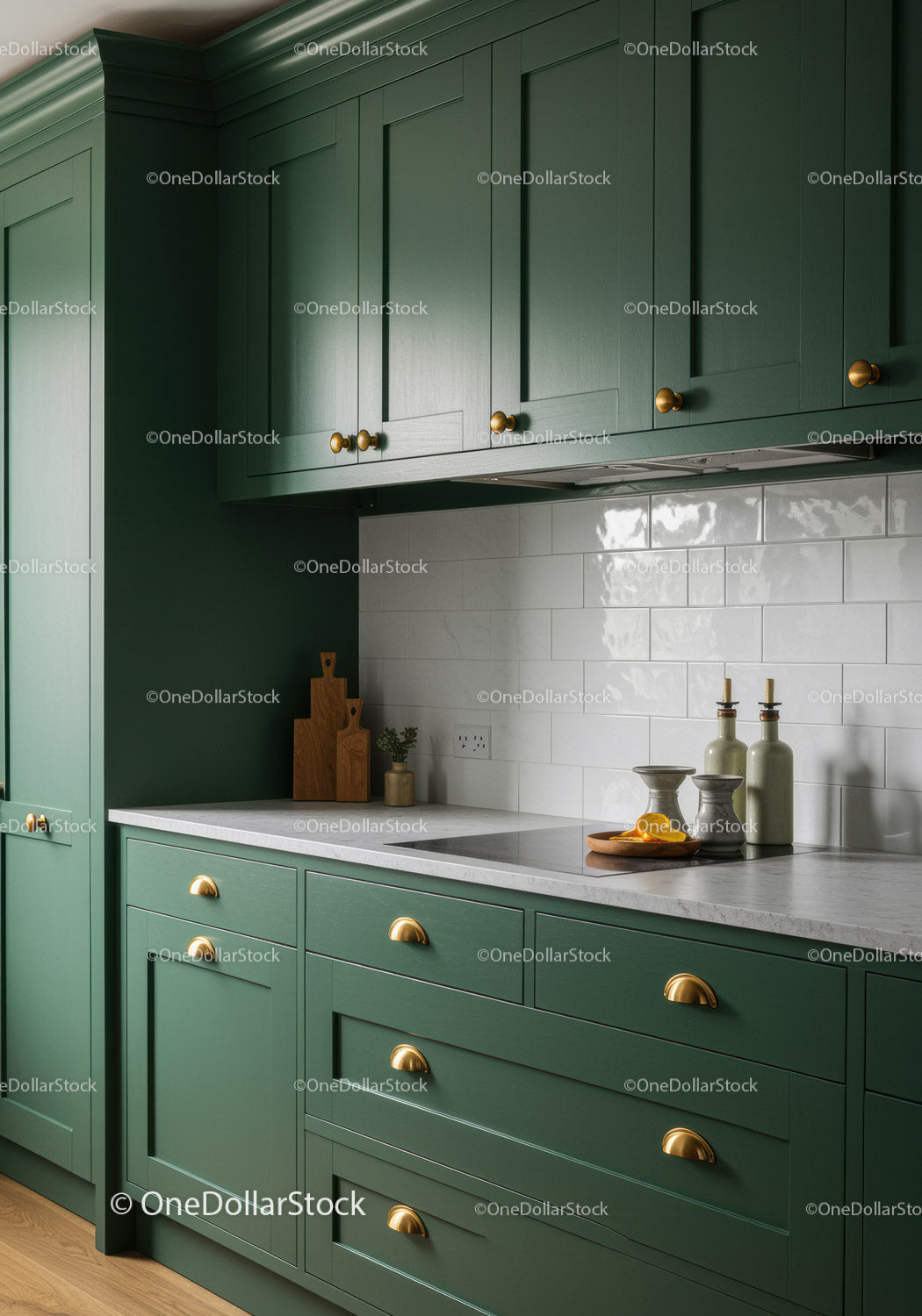 Elegant Green Kitchen Cabinets with White Marble Countertop and Brass Accents