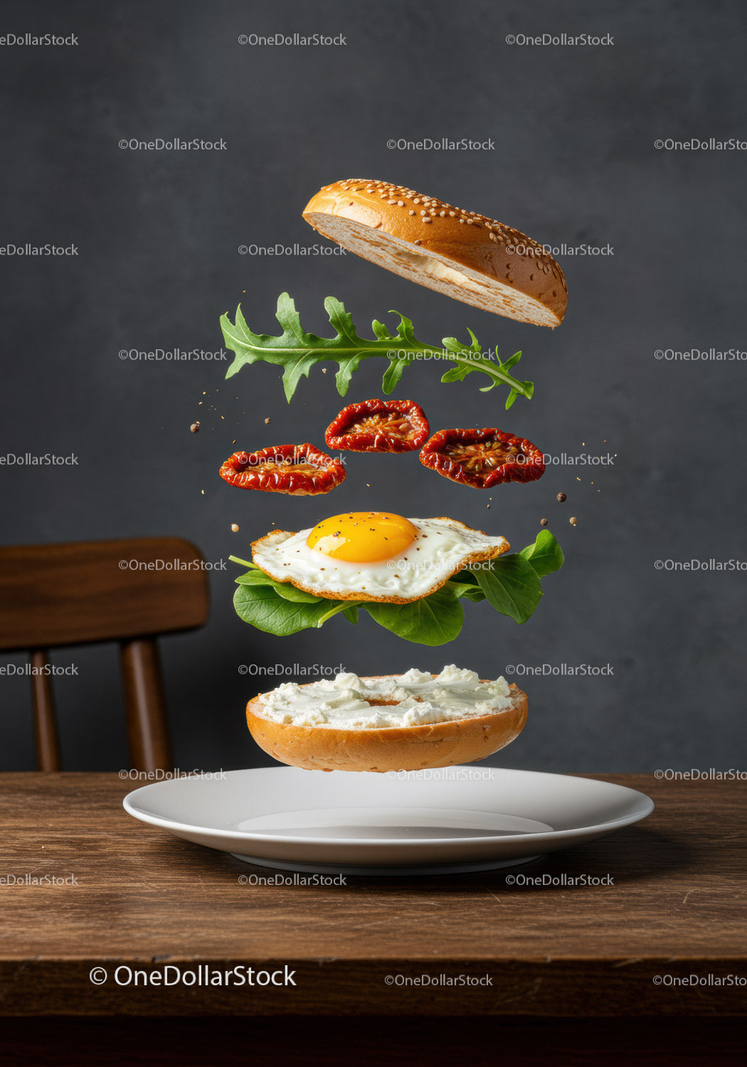 Deconstructed breakfast bagel with egg and greens