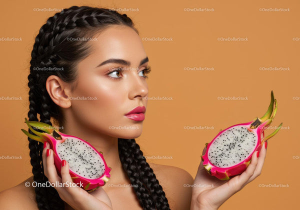 Elegant Woman Holding Fresh Dragon Fruits with Bright Background