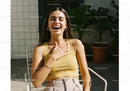 Joyful Young Woman Laughing Outdoors in Summer Casual Attire