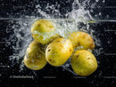 Fresh Yellow Quince Fruits with Water Splash Scene