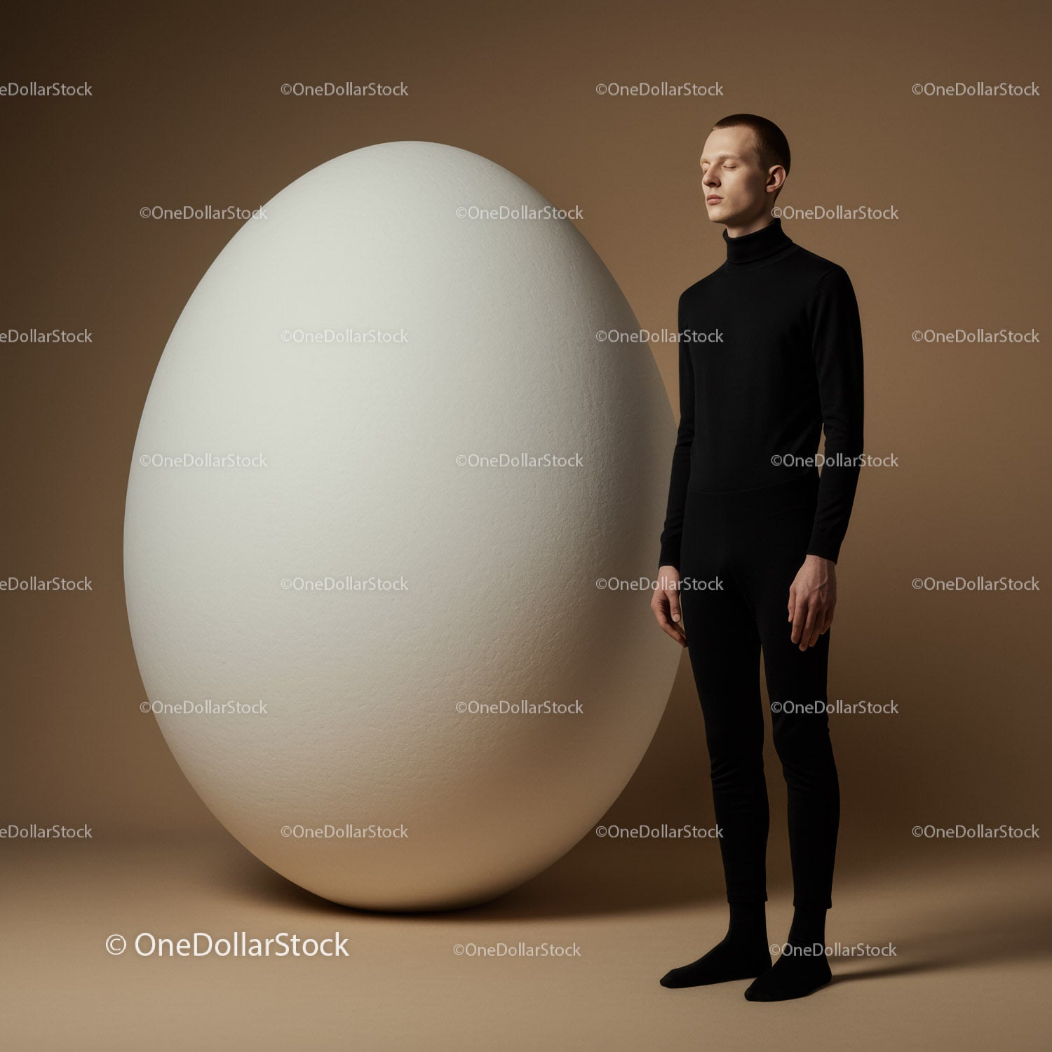 Calm man standing with eyes closed near giant white egg