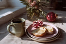 Morning Coffee and Toast with Pomegranate on Rustic Table