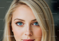 Close up portrait of young woman with blue eyes and blonde hair