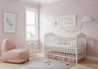 Cute Baby Nursery with Pink Armchair and Wall Art Decor