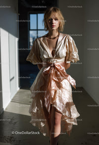 Elegant Satin Dress with Layered Skirt and Metallic Finish