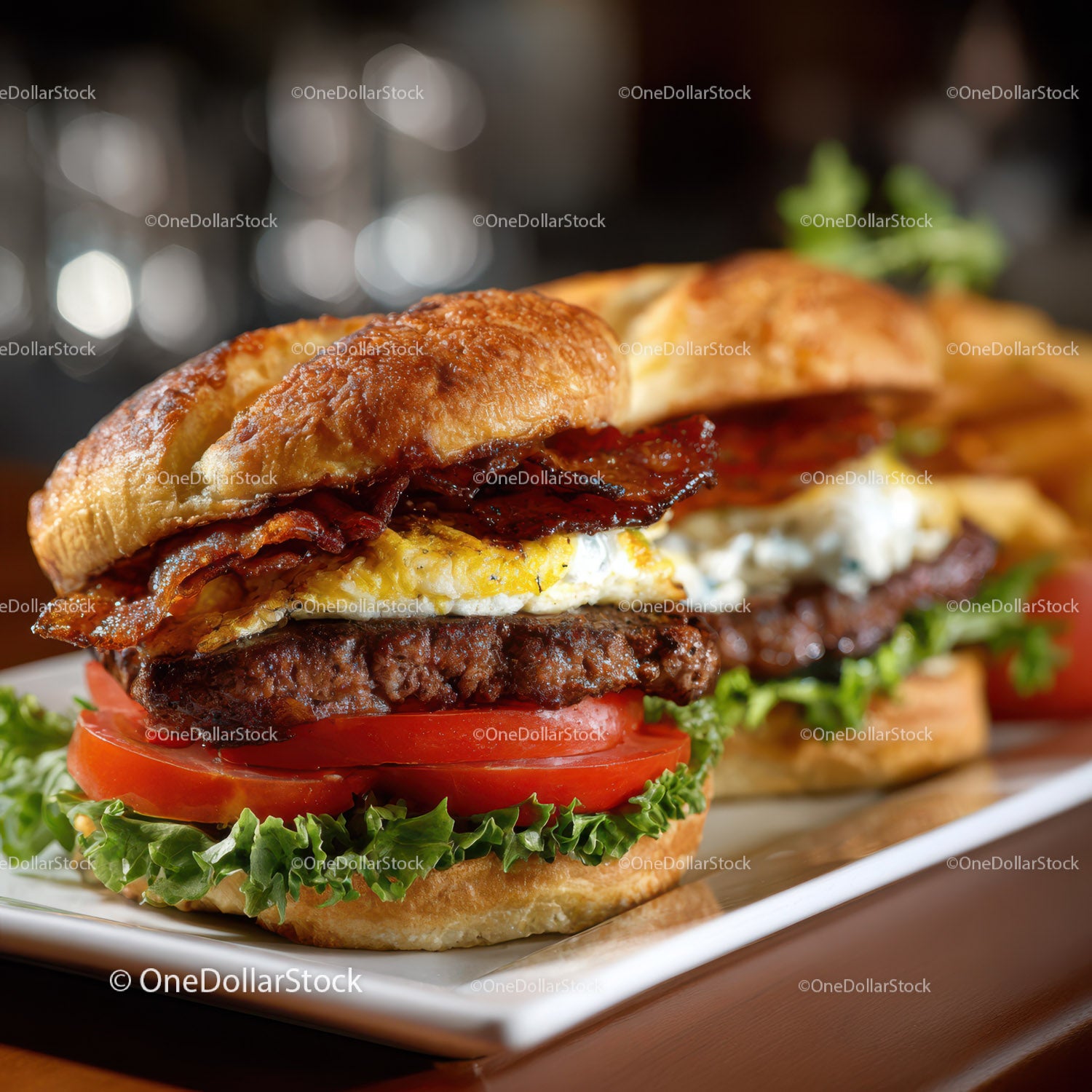 Gourmet Bacon Cheeseburger with Fried Egg and Fresh Vegetables