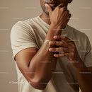 Close-Up of Man Applying Lotion to Arm for Skin Hydration