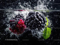 Fresh Blackberries Splashing into Water in a Vivid Nature Scene