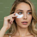 Close-up of Woman Applying Under Eye Patches for Skin Rejuvenation