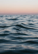 Calm Ocean Waves with Soft Pastel Sky in Tranquil Seascape