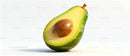Fresh Half Avocado with Seed on White Background