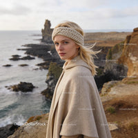 Woman Wearing Wool Cape and Knit Headband by Sea