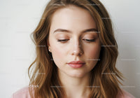 Beautiful Young Woman with Natural Makeup and Relaxed Expression