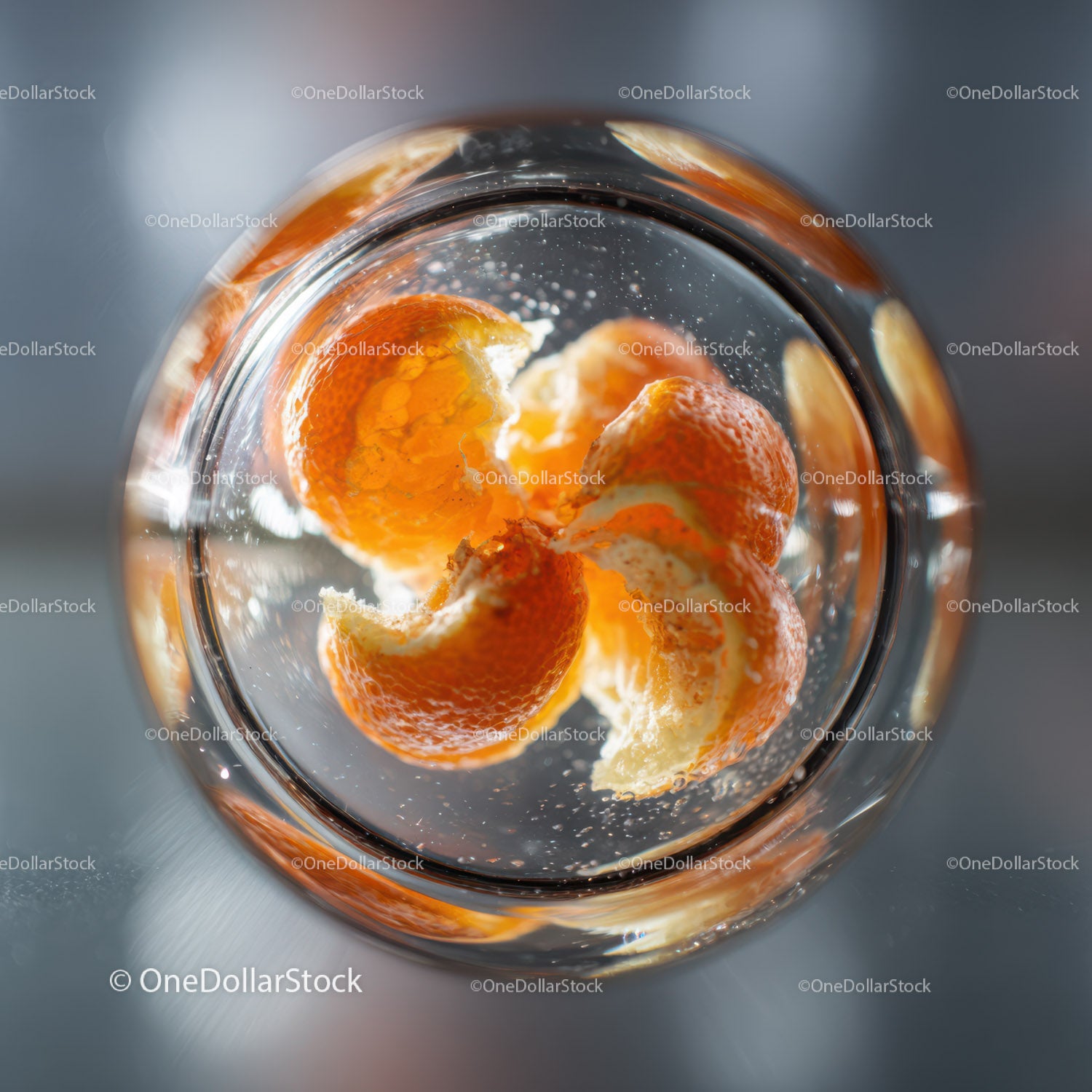 Close-up of Juicy Orange Peels Floating in Water