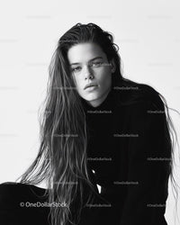 Striking Black and White Portrait of a Young Woman with Wavy Hair