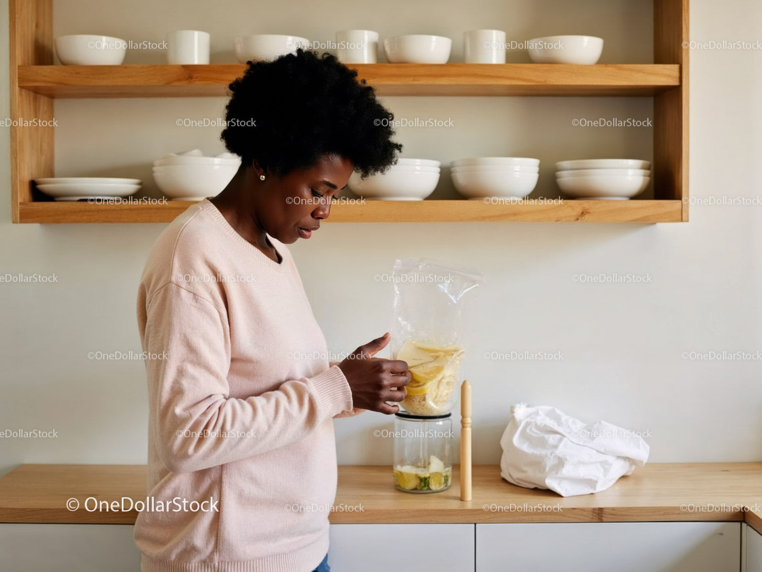 Woman Preparing Fruit Smoothie in Modern Kitchen
