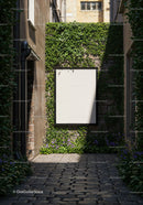 Blank billboard on ivy covered wall in narrow alley