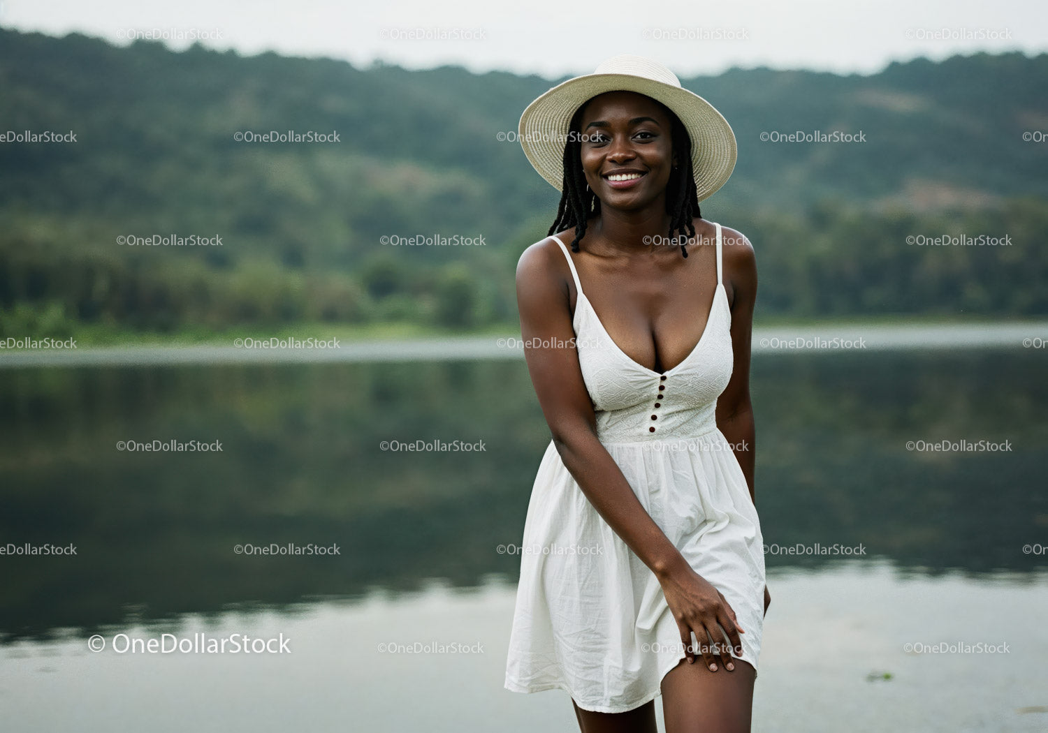 Beautiful Woman in White Dress with Wide-Brim Hat by Lake