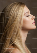 Profile of serene blonde woman with smooth skin