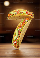Fresh tacos with avocado and colorful fillings on table