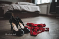 Chic Black Heels and a Red Lace Dress in a Cozy Bedroom Setting