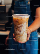 Iced Coffee with Milk in Clear Plastic Cup for Refreshing Summer Drinks