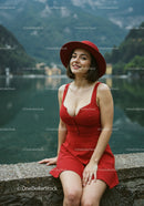 Elegant Woman in Red Dress Smiling by Lake Outdoors