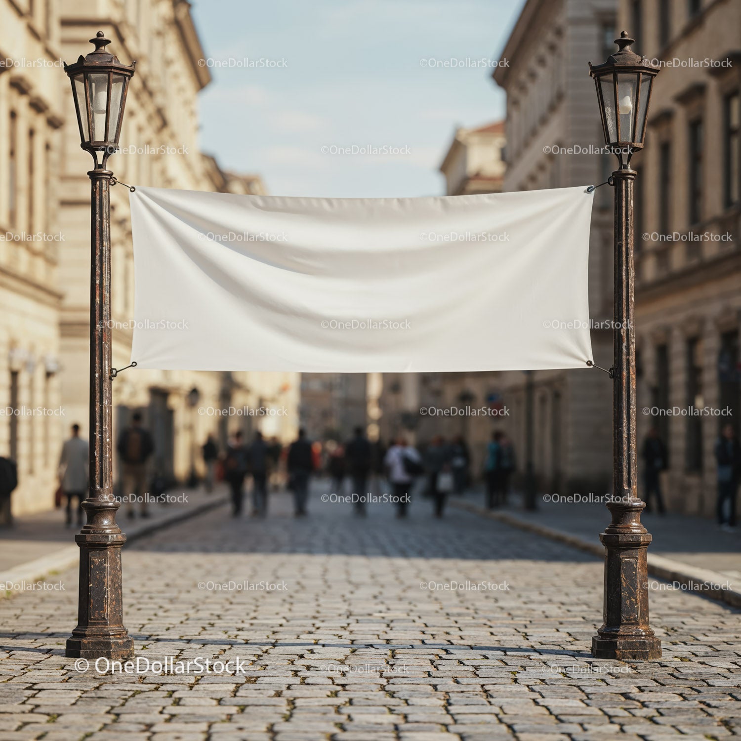 Blank banner between vintage street lamps on city road