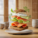 Deconstructed salmon sandwich with creamy dill sauce