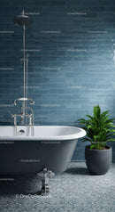 Vintage clawfoot bathtub with shower and green plant